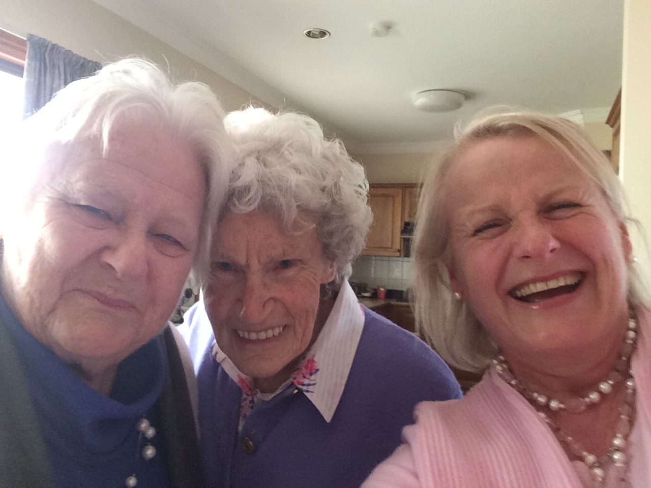 Mum, Nancy &amp; Janatha found something very funny at Chewton (date unknown).